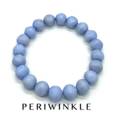 Single lucite beaded bracelet in periwinkle on a white background