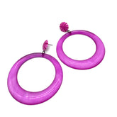 Purple hoop earrings on a white background