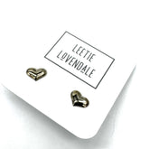 Heart-shaped earrings on a card with &