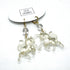 Crystal horse earrings on a white background with &