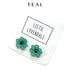 Teal flower stud earrings on a white background