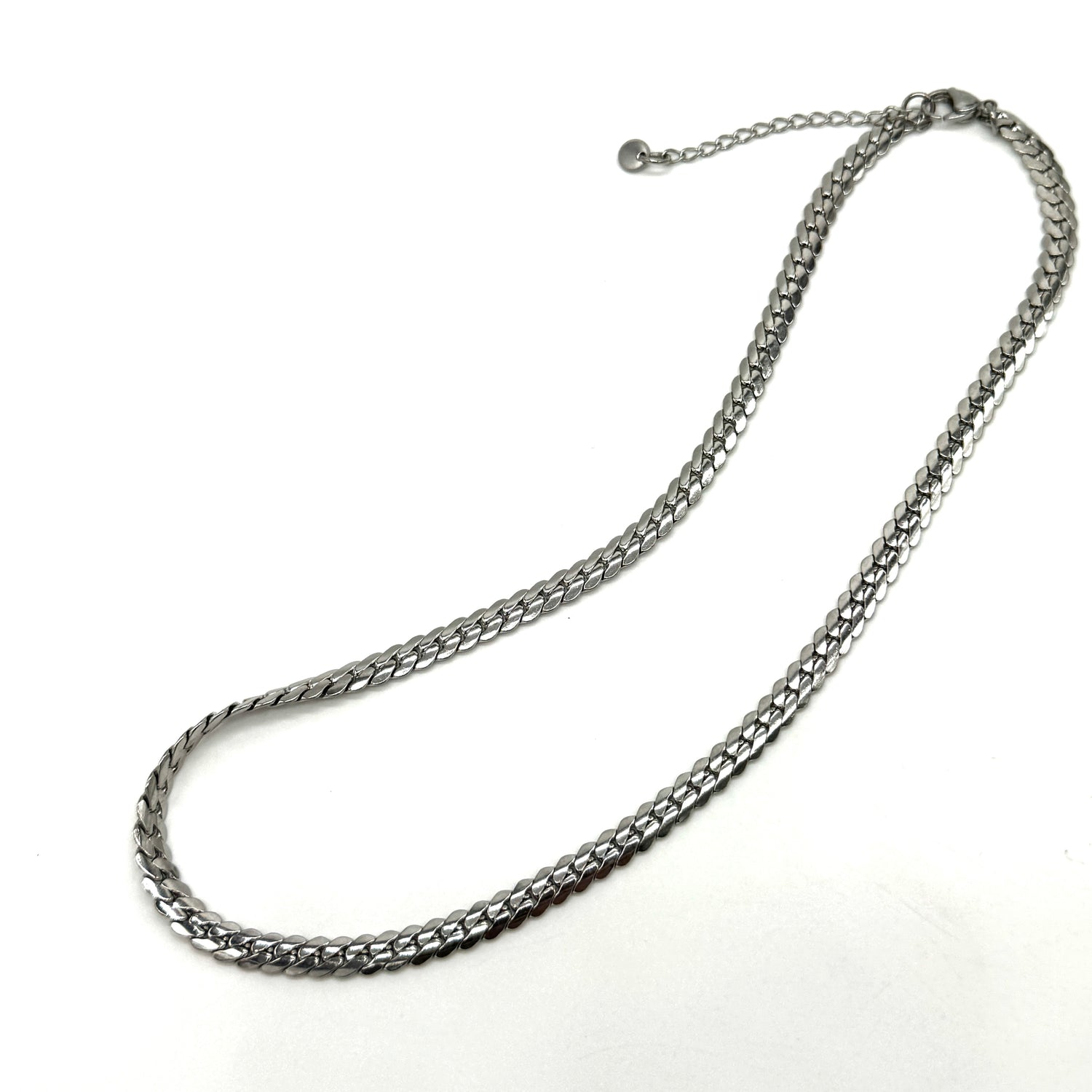Adjustable silver snake chain necklace on a white background.