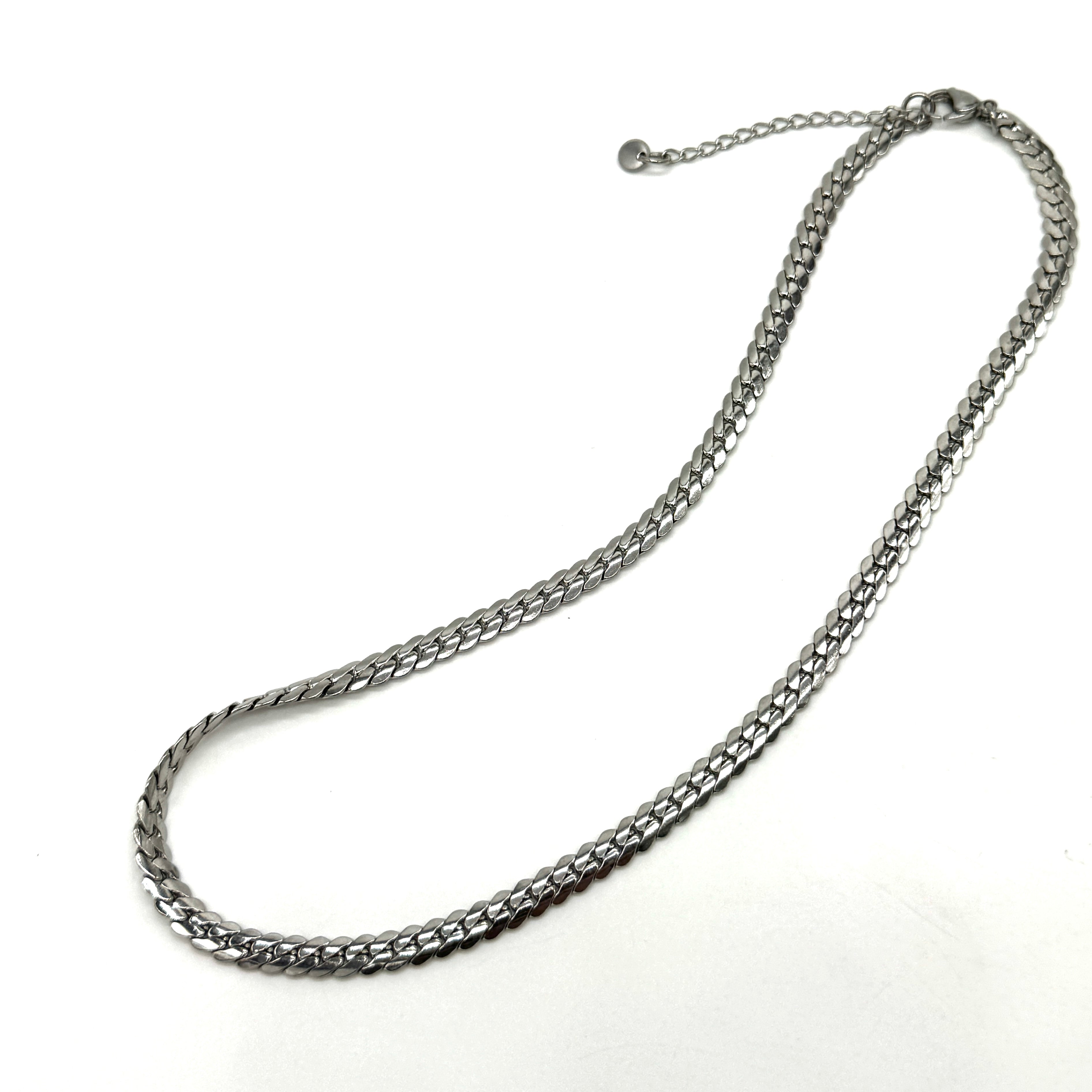 Adjustable silver snake chain necklace on a white background.