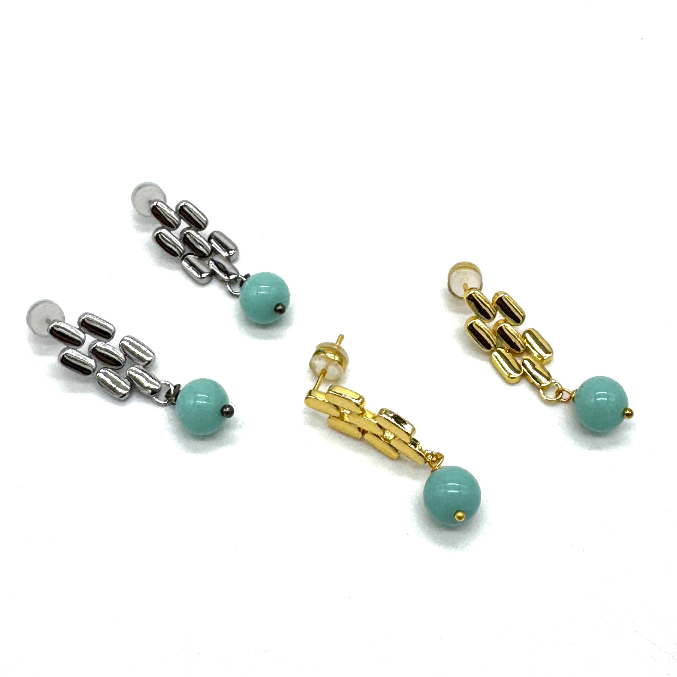 Silver and gold drop earrings with  turquoise glass beads.