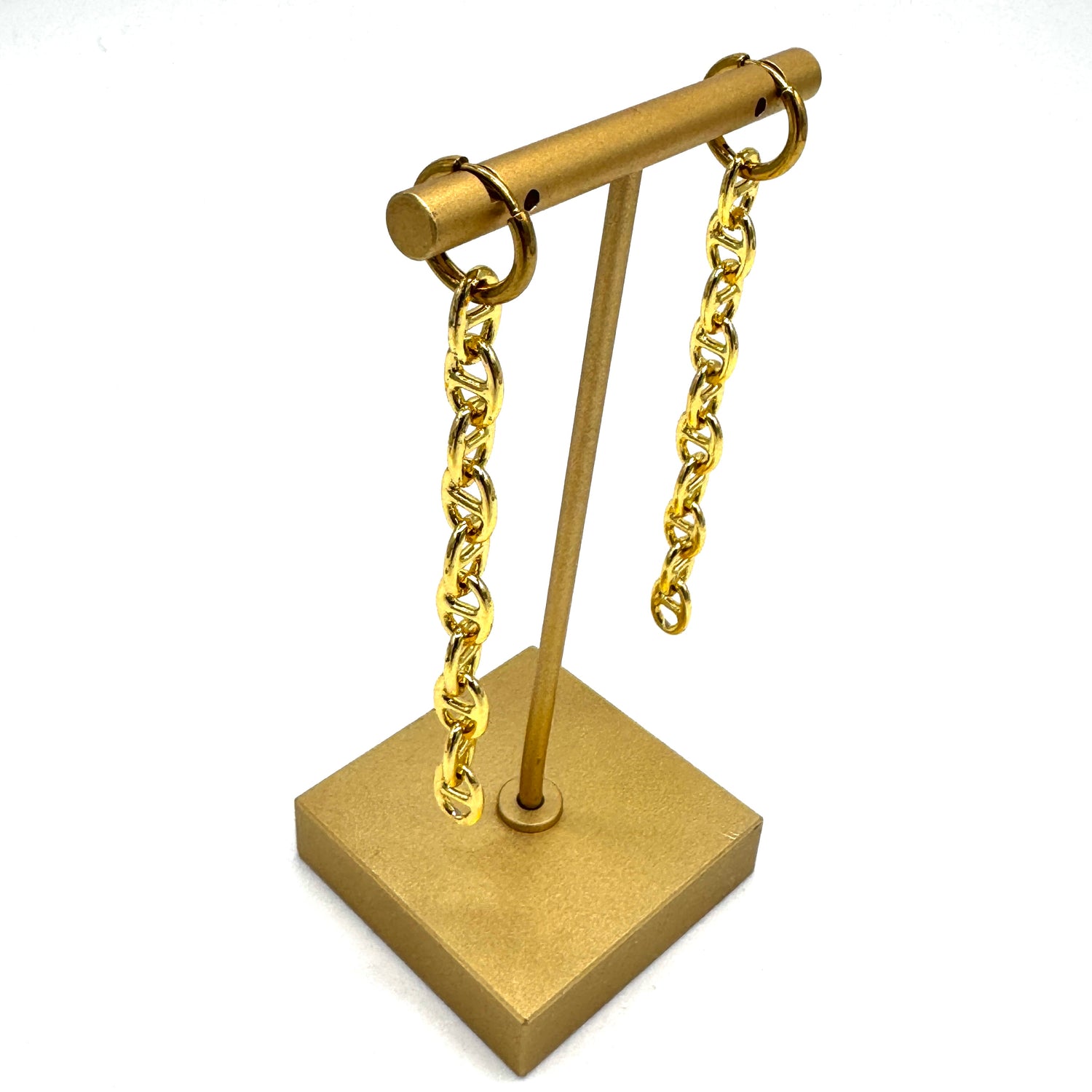 Gold-tone chain earrings displayed on a matching gold jewelry stand against a plain white background.