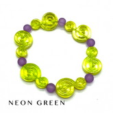 A beaded stretch bracelet featuring translucent neon green spiral-shaped beads and matte purple round beads, displayed on a white background with the text &