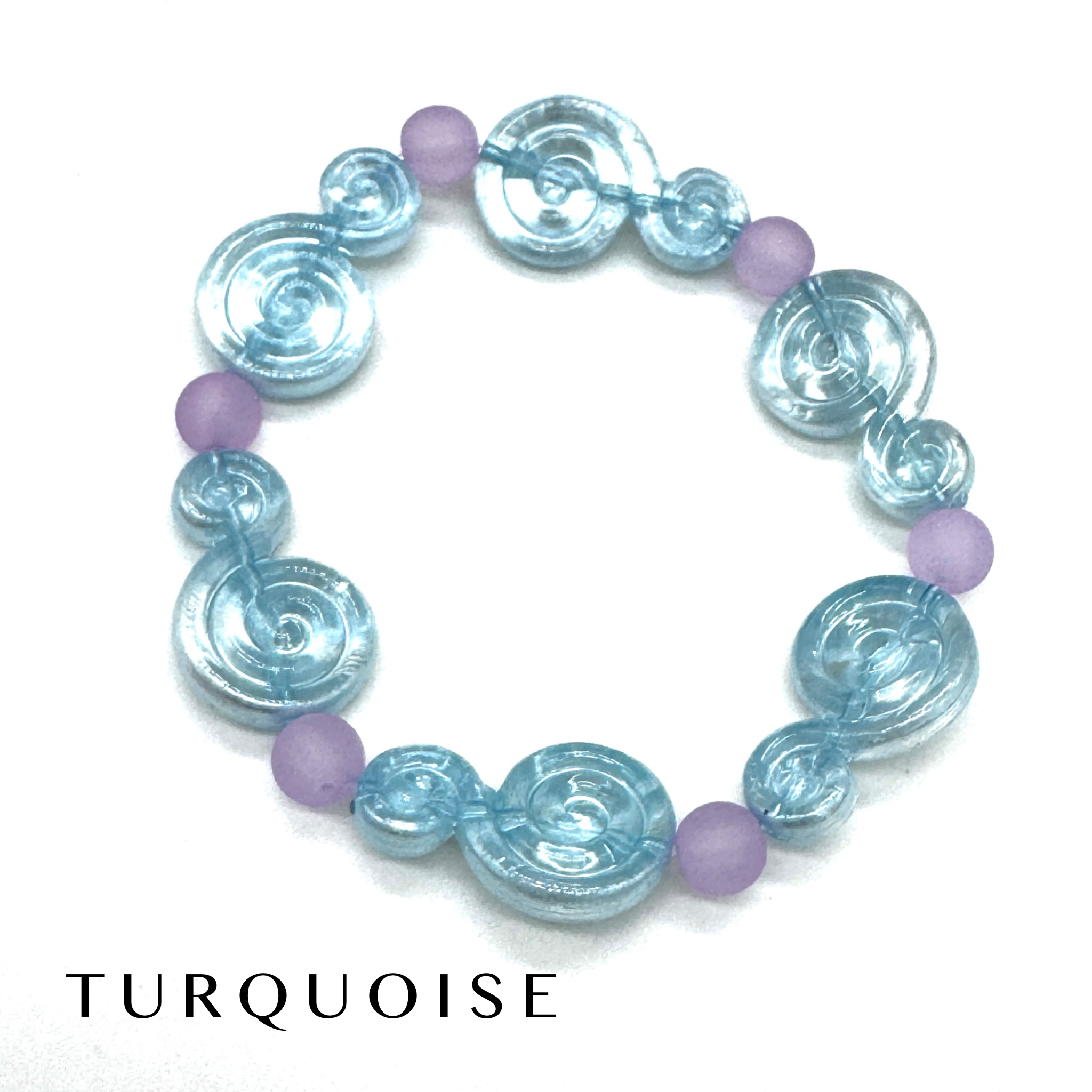 A beaded stretch bracelet featuring translucent light blue spiral beads and matte lavender purple round beads, displayed on a clean white background with the word &