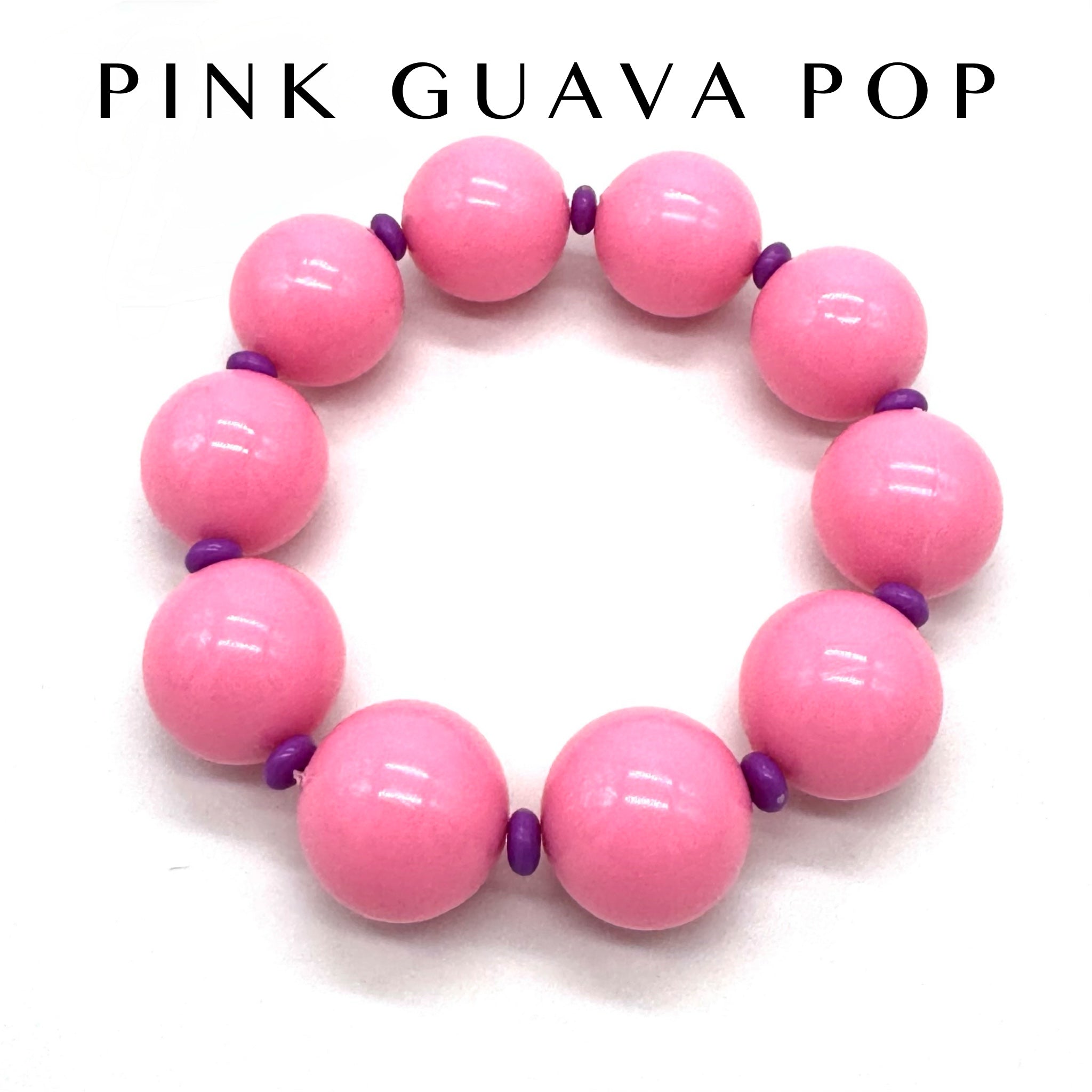 Pink beaded bracelet with purple accents on a white background, branded &