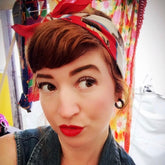 retro vintage girl with hoop earrings and head scarf