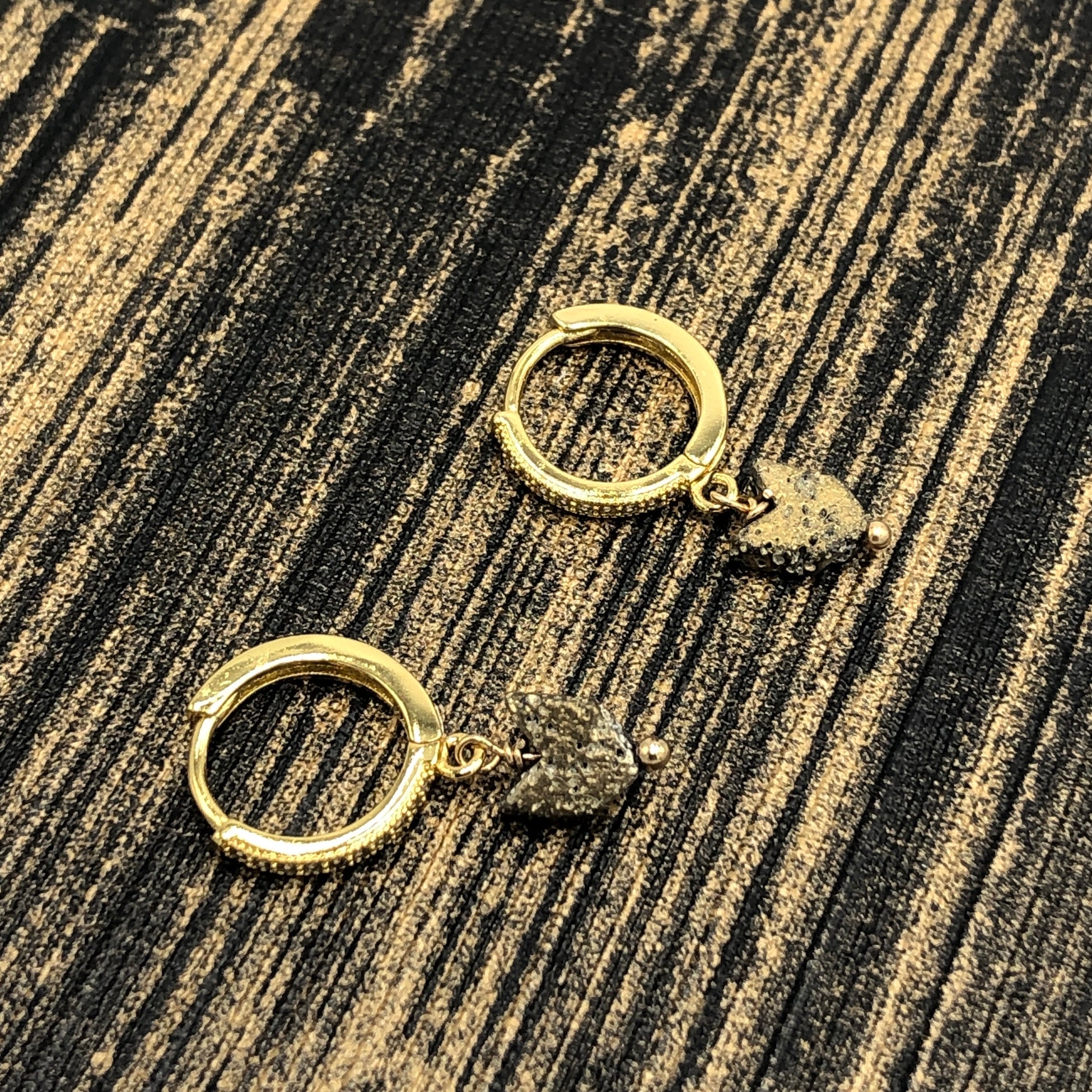 hinged gold hoops with stones