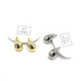 gold silver swish earrings