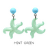 Mint green starfish earrings with turquoise beads on a white background