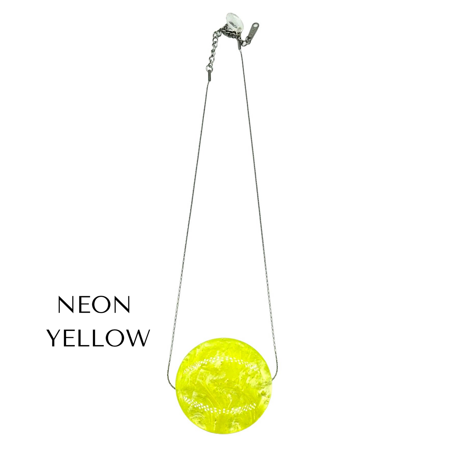 Neon yellow round pendant necklace on a white background