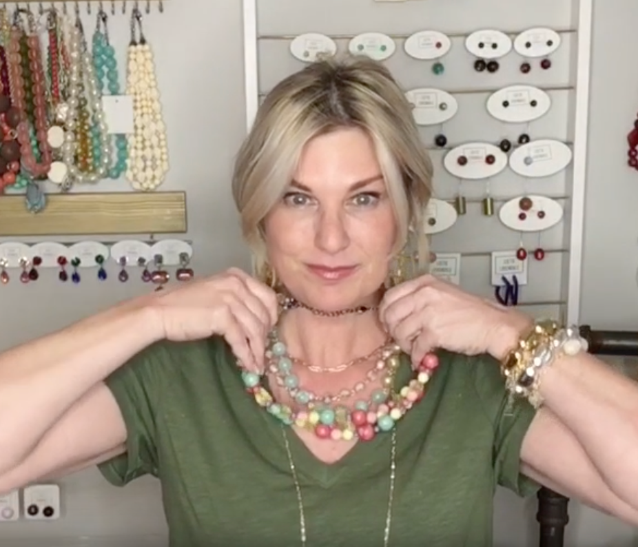 Load video: girl layering necklaces