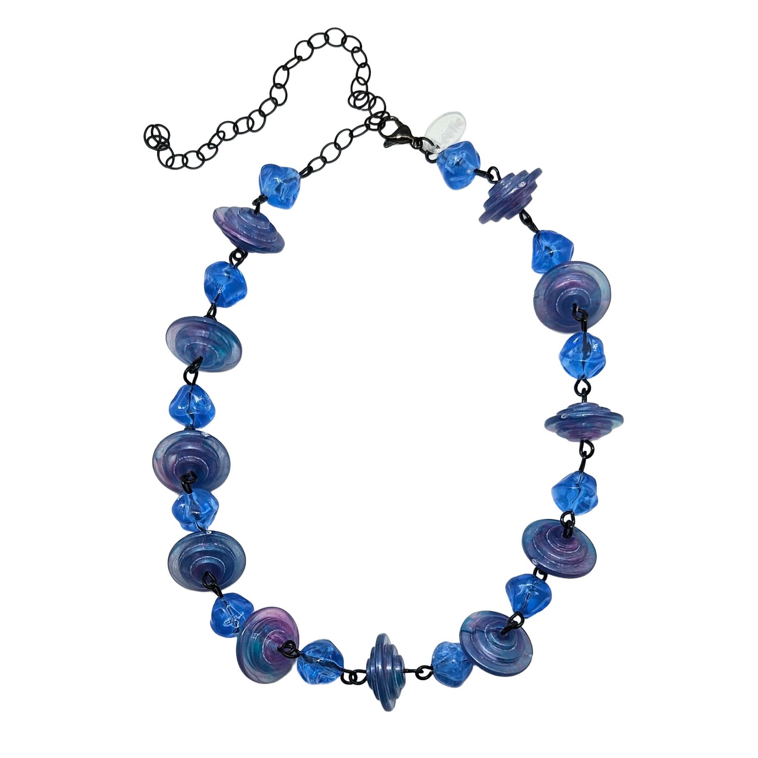 Necklace with blue and purple beads on a white background