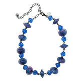 Necklace with blue and purple beads on a white background