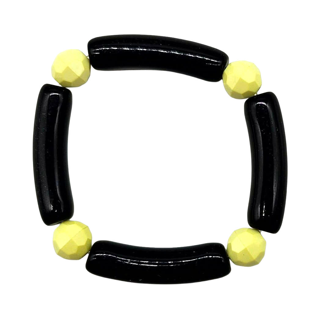 Black and yellow beaded bracelet on a white background