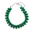 Opaque green beaded necklace on a white background.