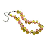 Necklace with multicolored beads on a white background