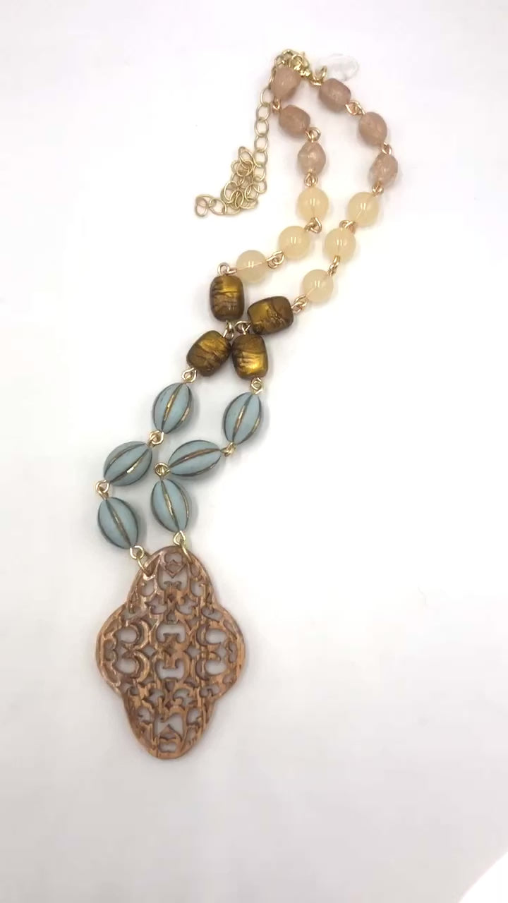 video of hand wired necklace with pendant