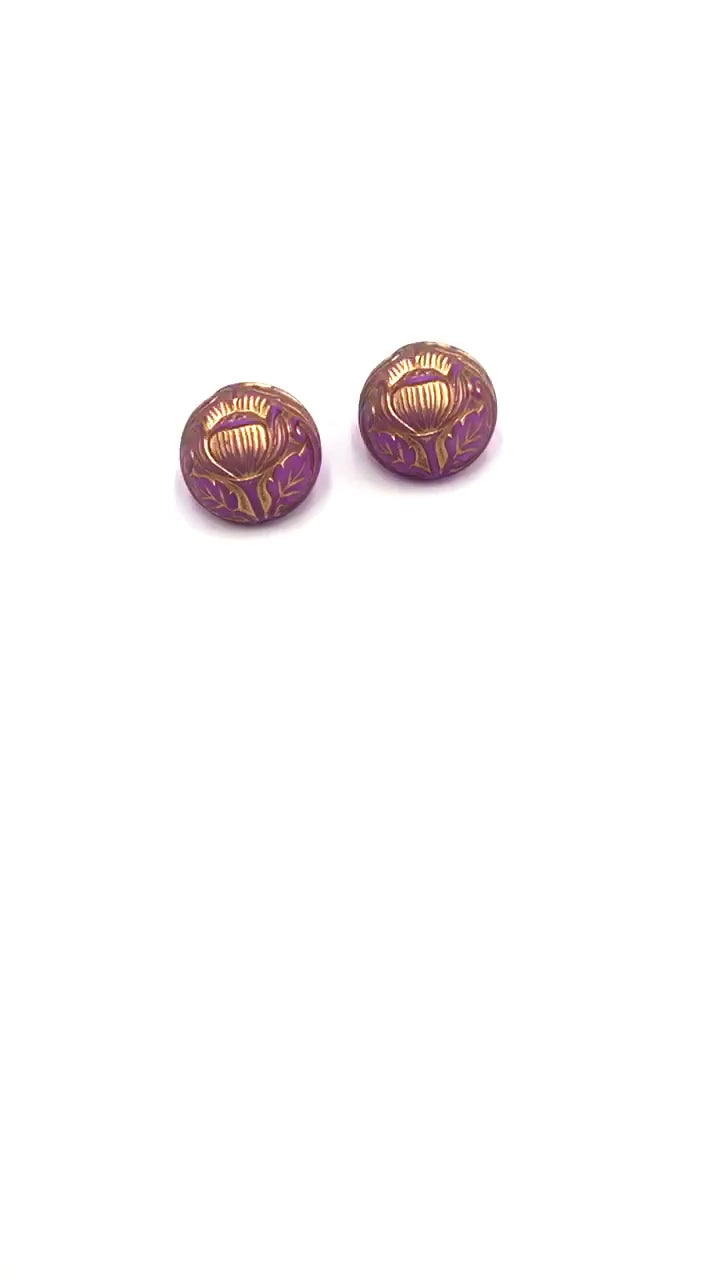 video of lilac button stud earrings with carved tulips