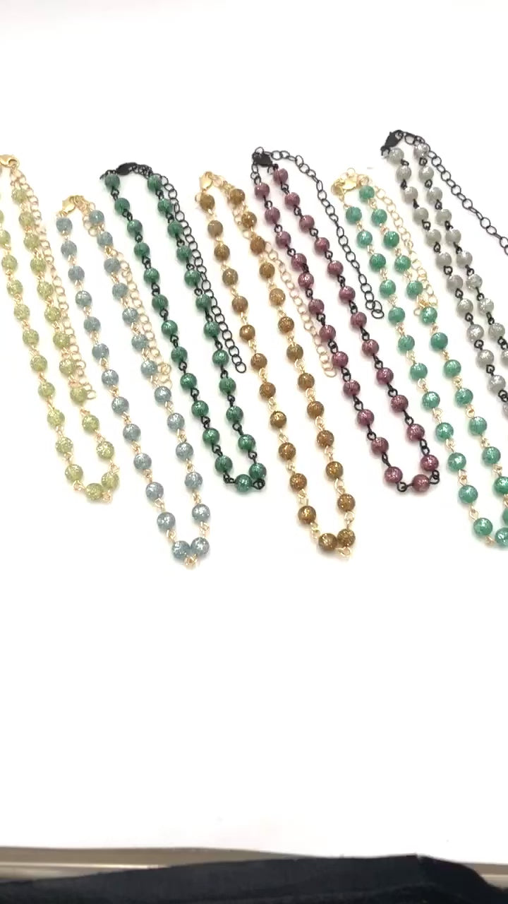 video of colorful hand wired beaded necklaces
