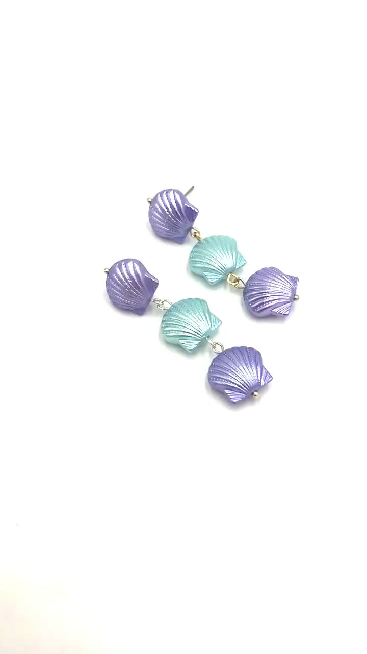 video of seashell looking earrings