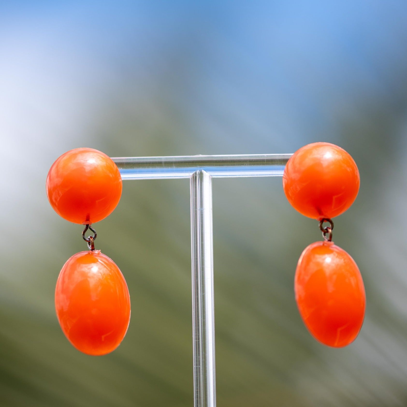 orange aura statement earrings