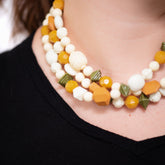 cream gold olive necklace