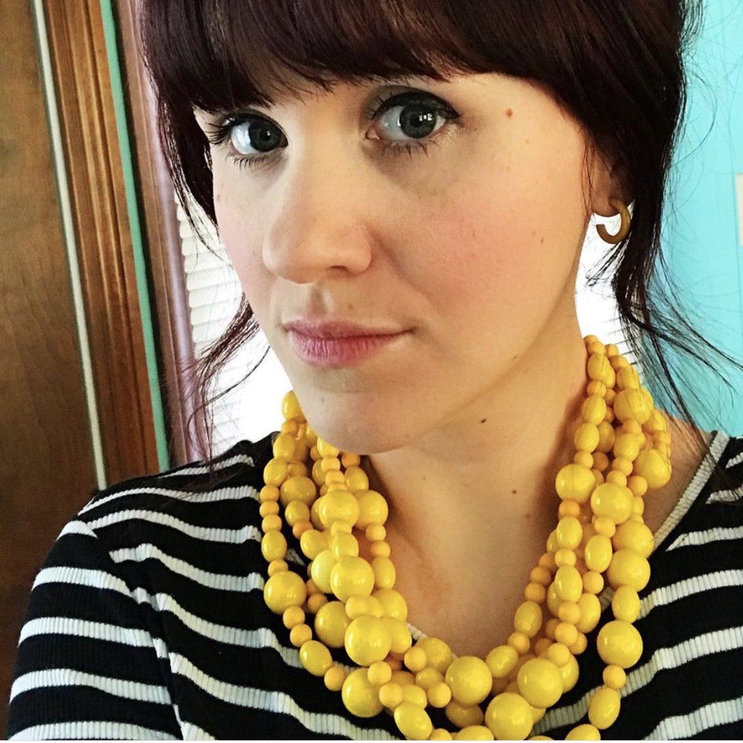 yellow statement necklace on girl