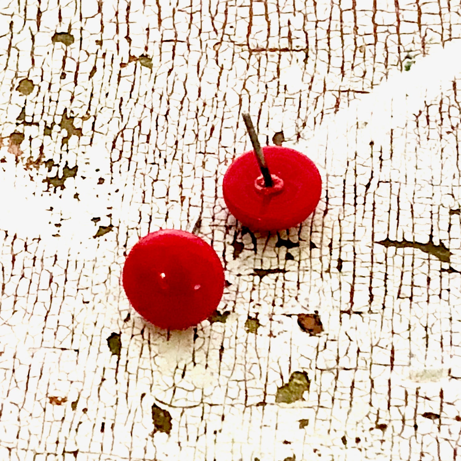 tiny red earrings