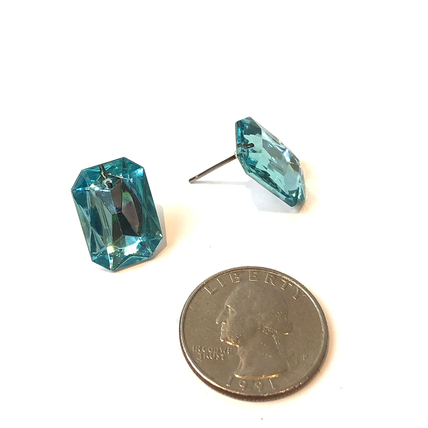 light blue faceted studs