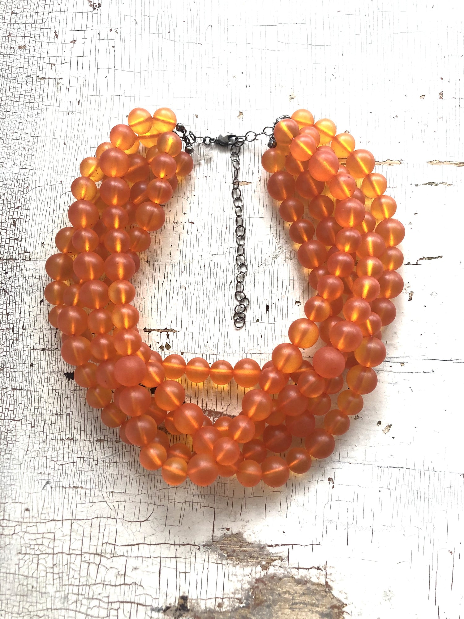 orange multi strand necklace