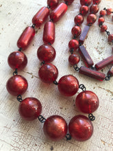 gold luster red beads