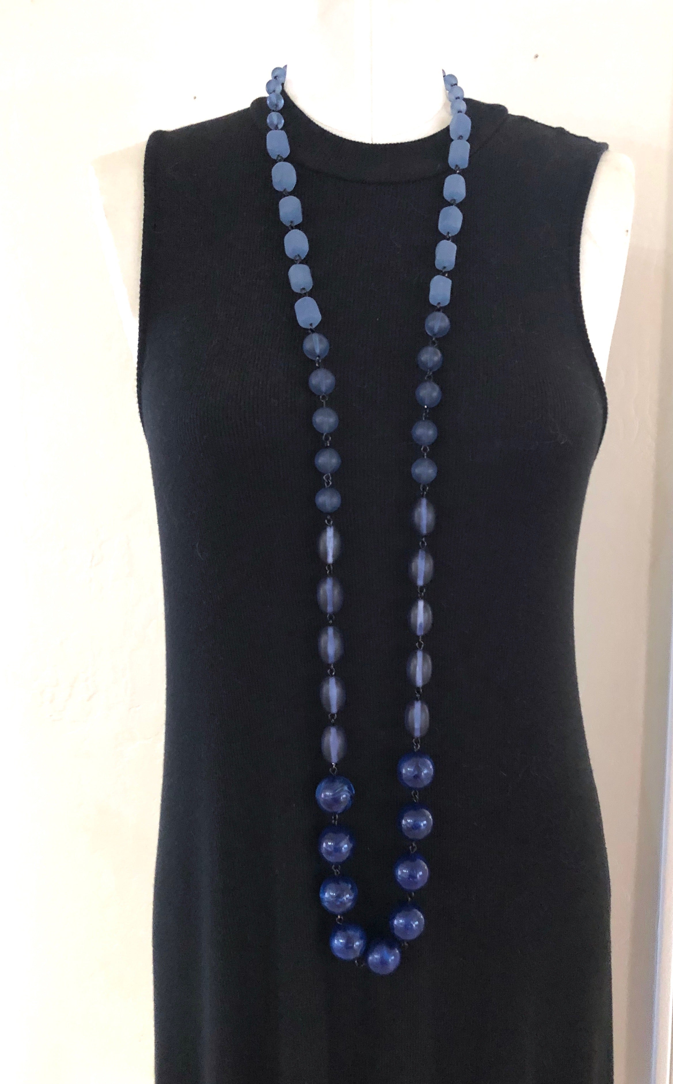 long blue beaded necklace