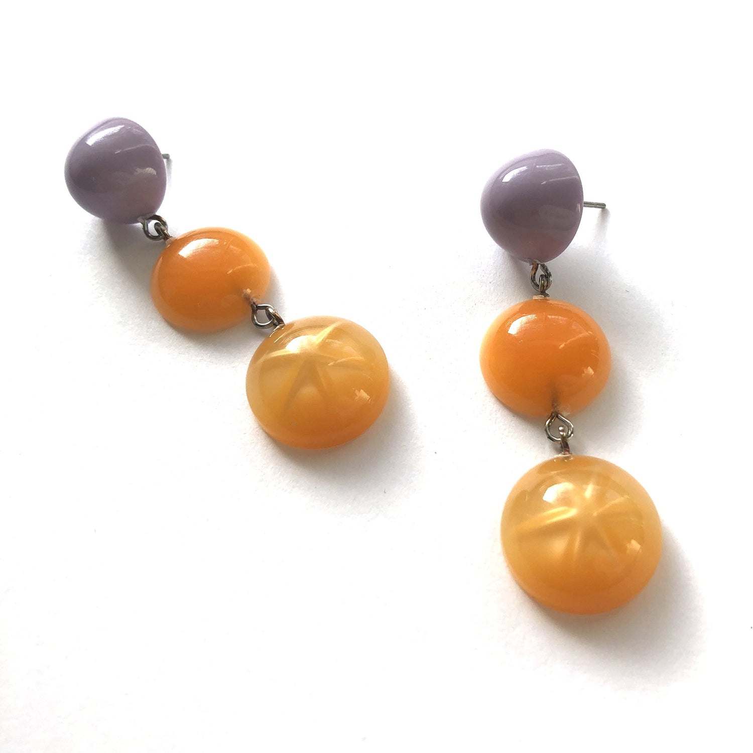 light orange statement earrings