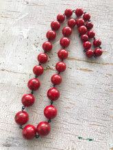red linked necklace