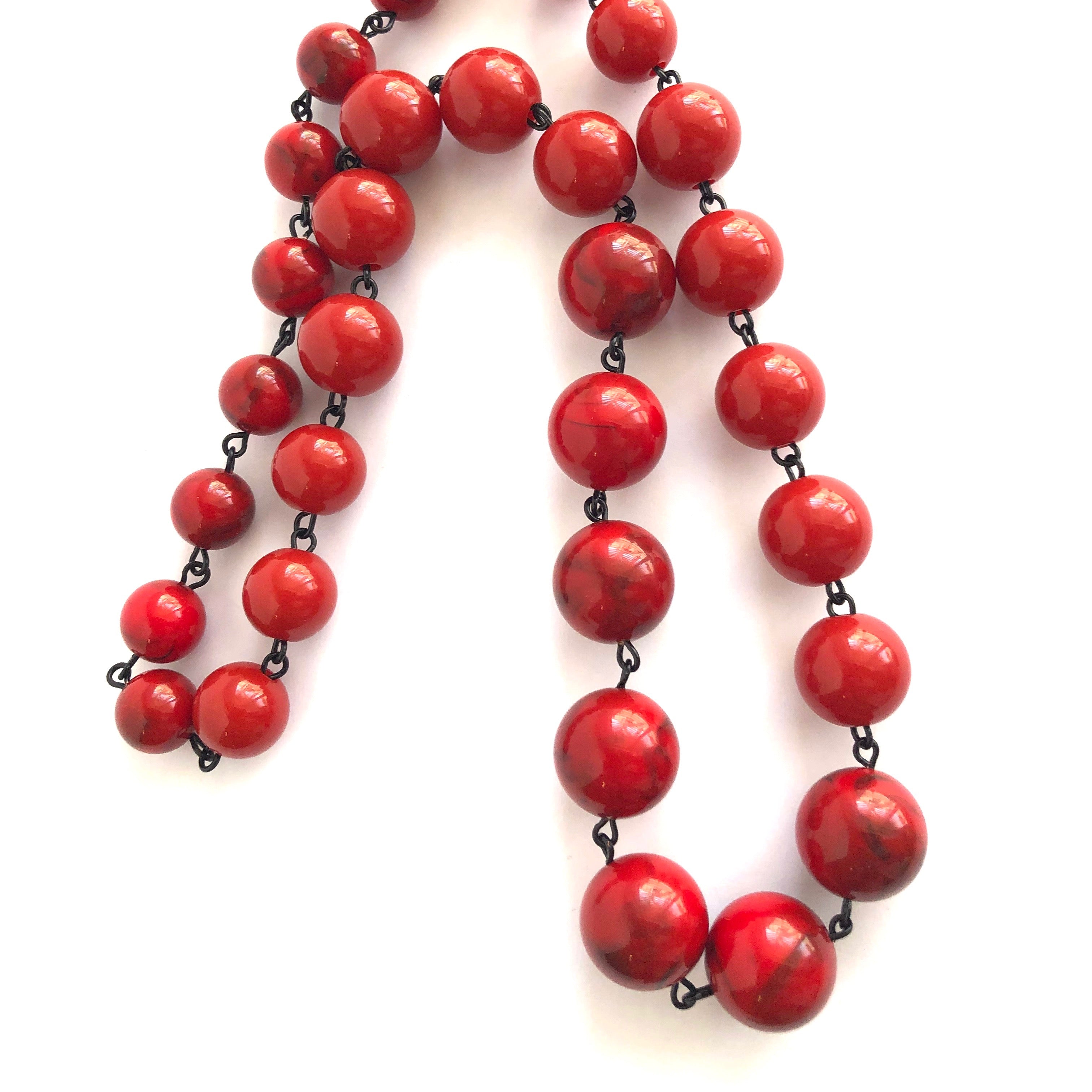 bright red linked necklace