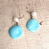 baby blue statement earrings