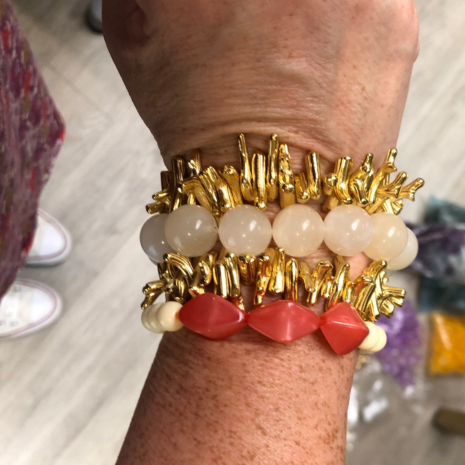 gold and cream bracelets set