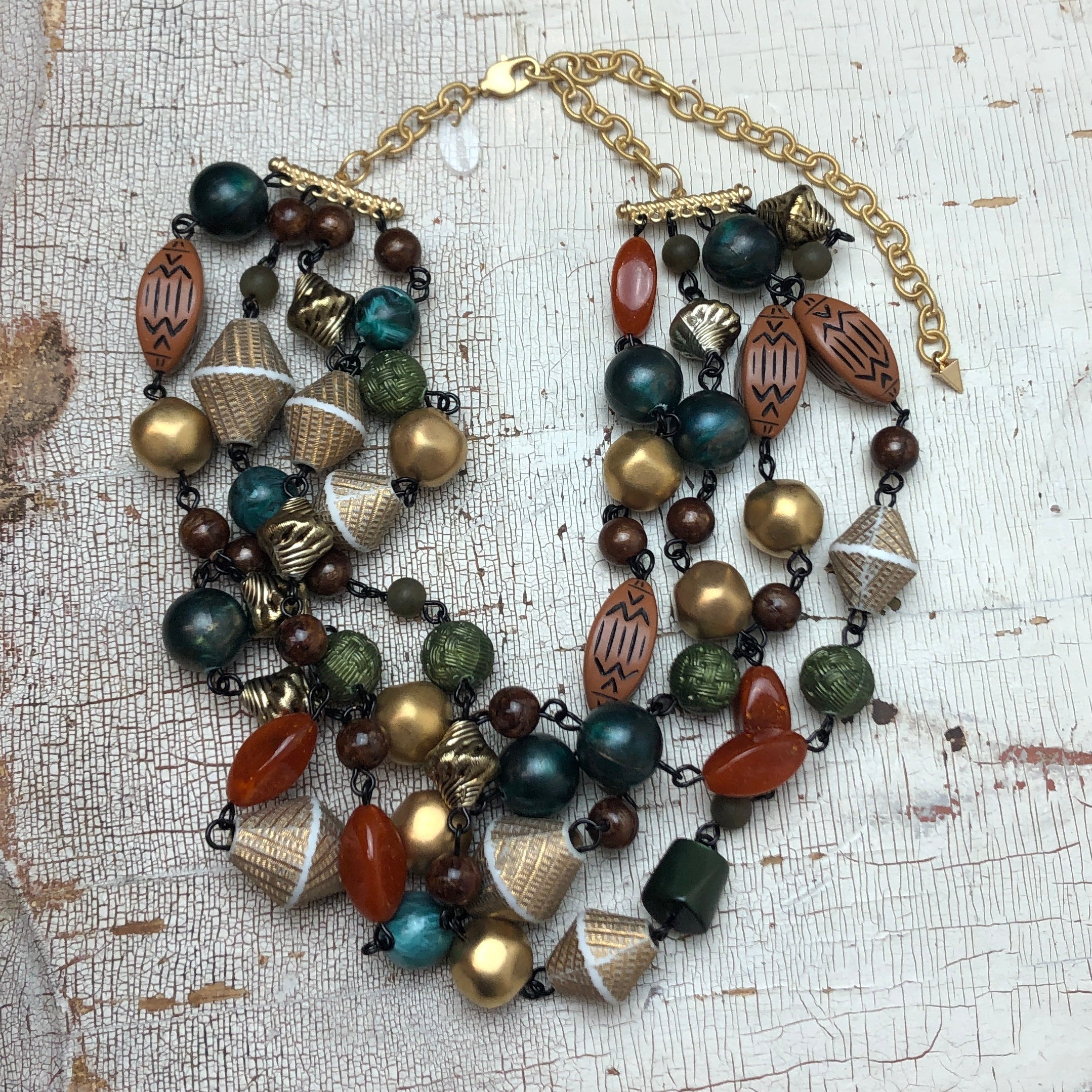 gold carved beaded necklace