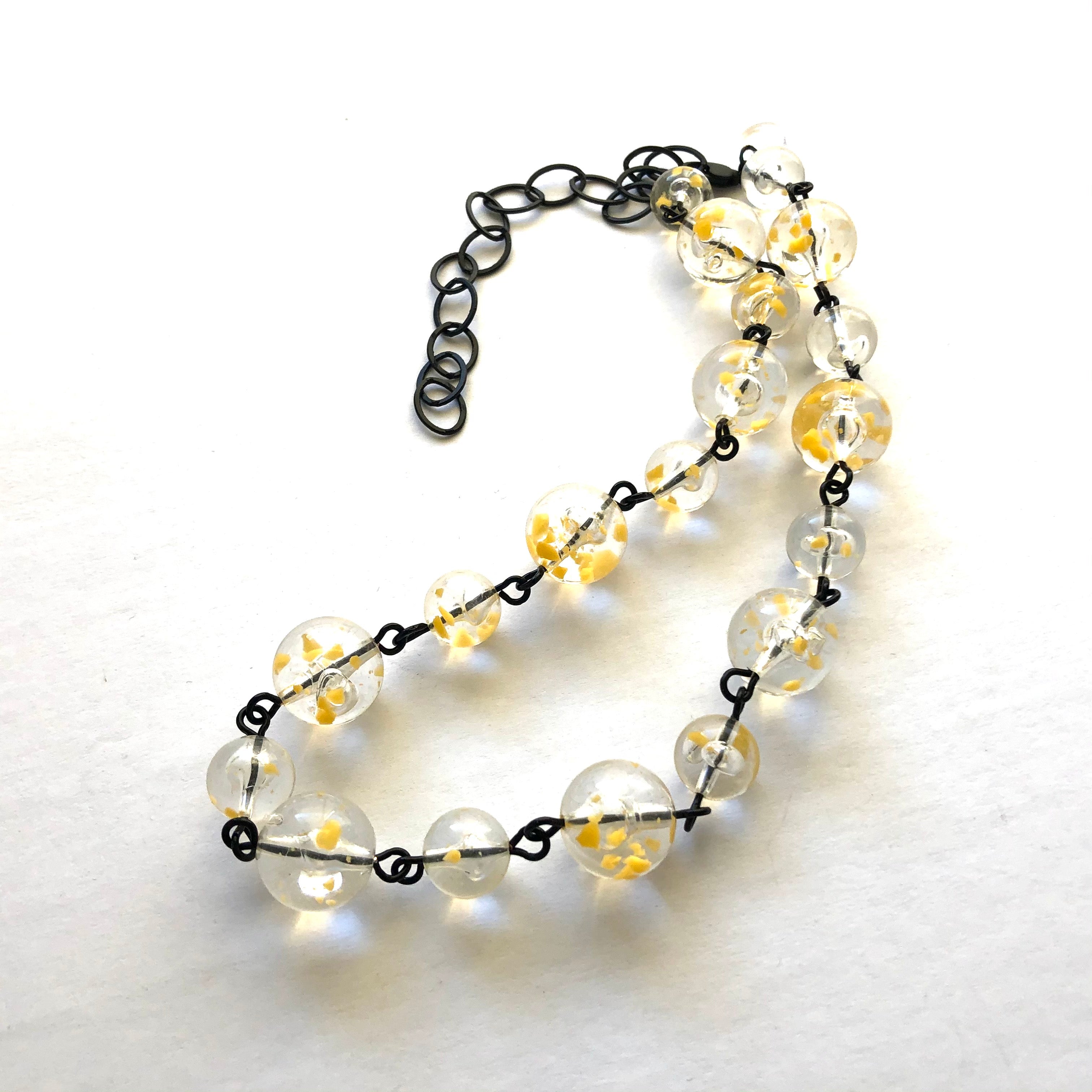 yellow clear necklace