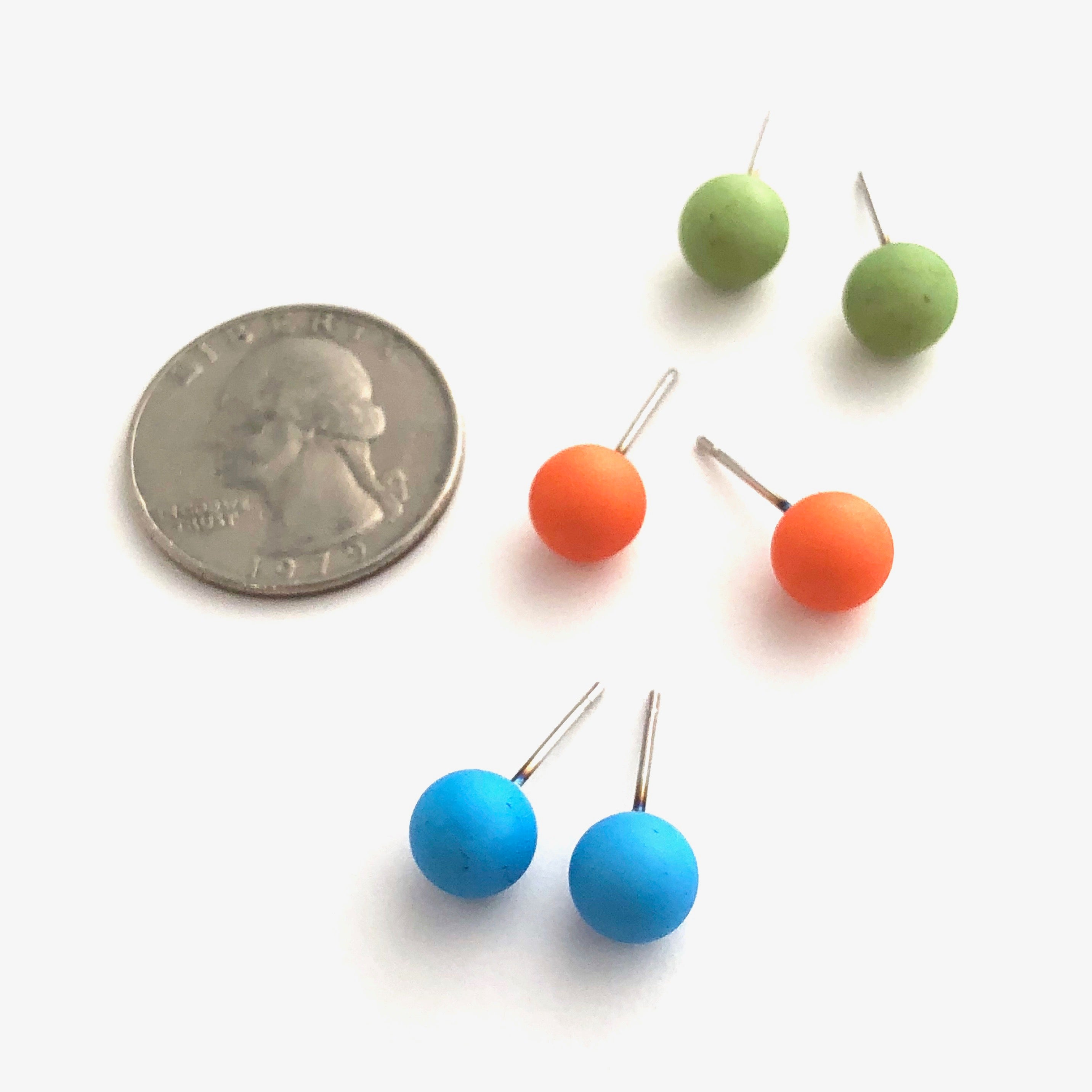 bright stud earrings