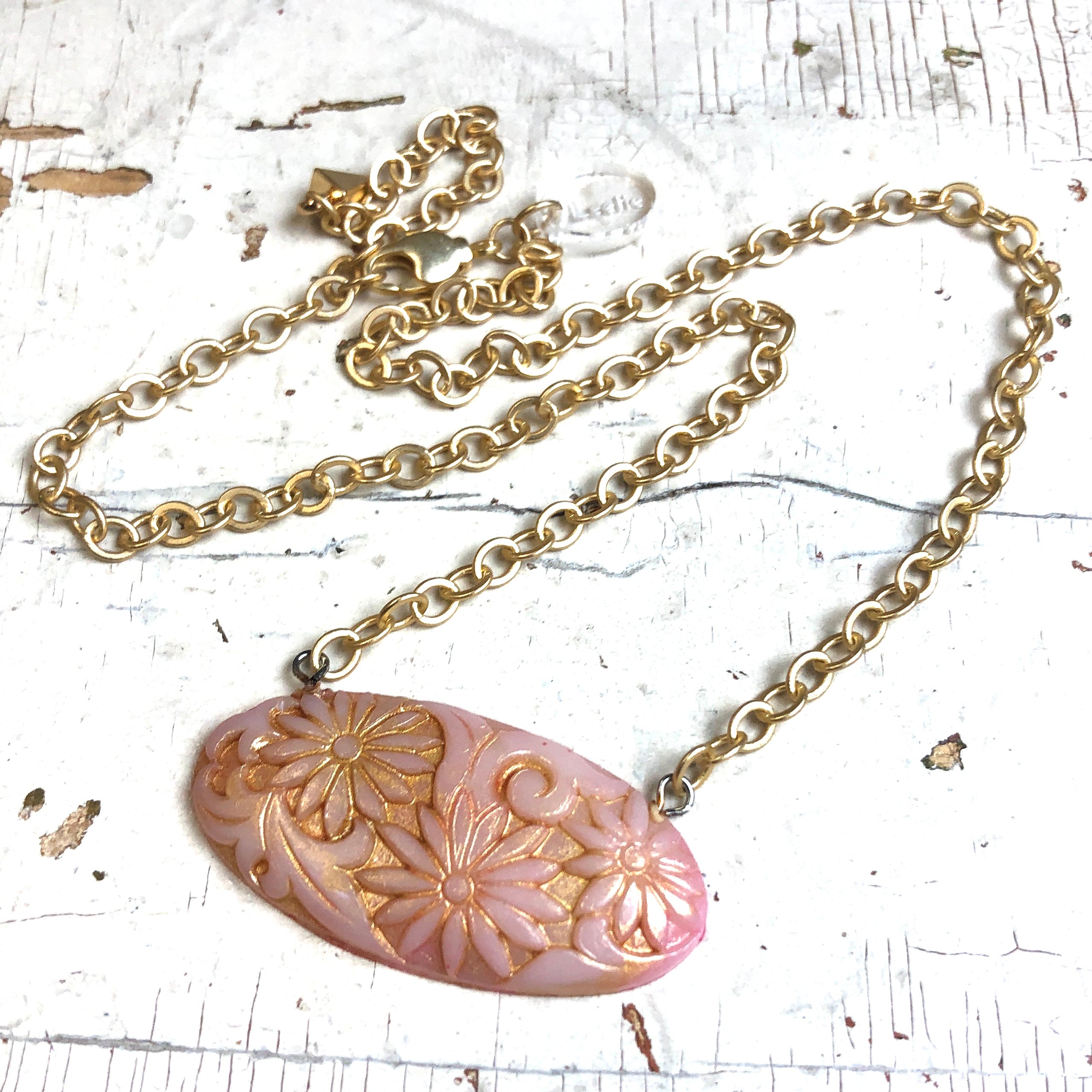 pastel pink and gold necklace
