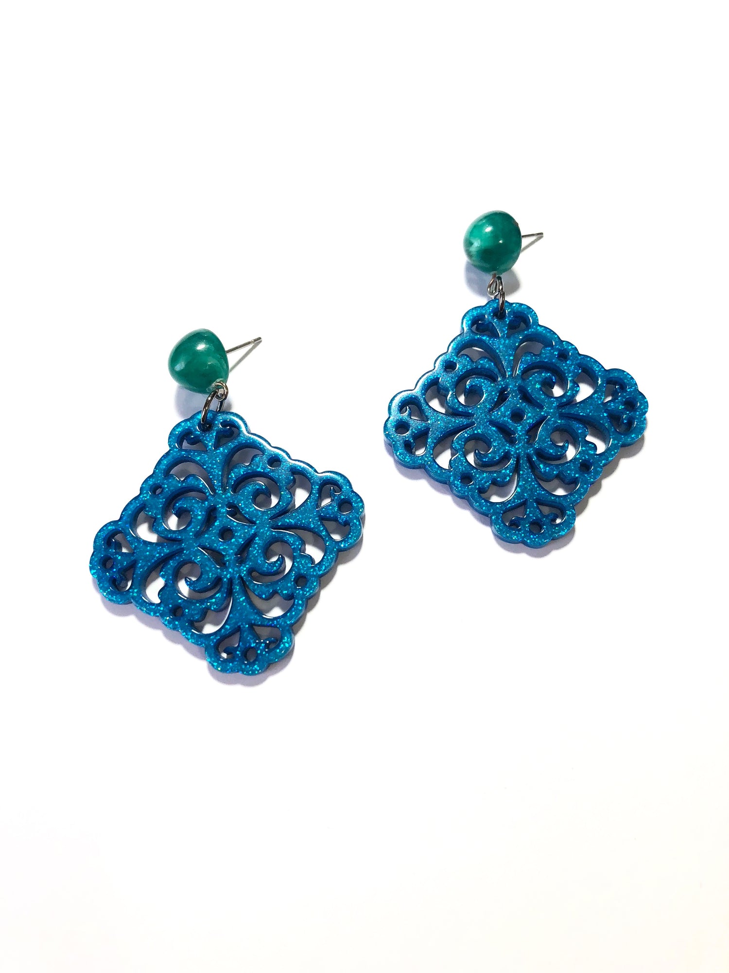 carved earrings blue
