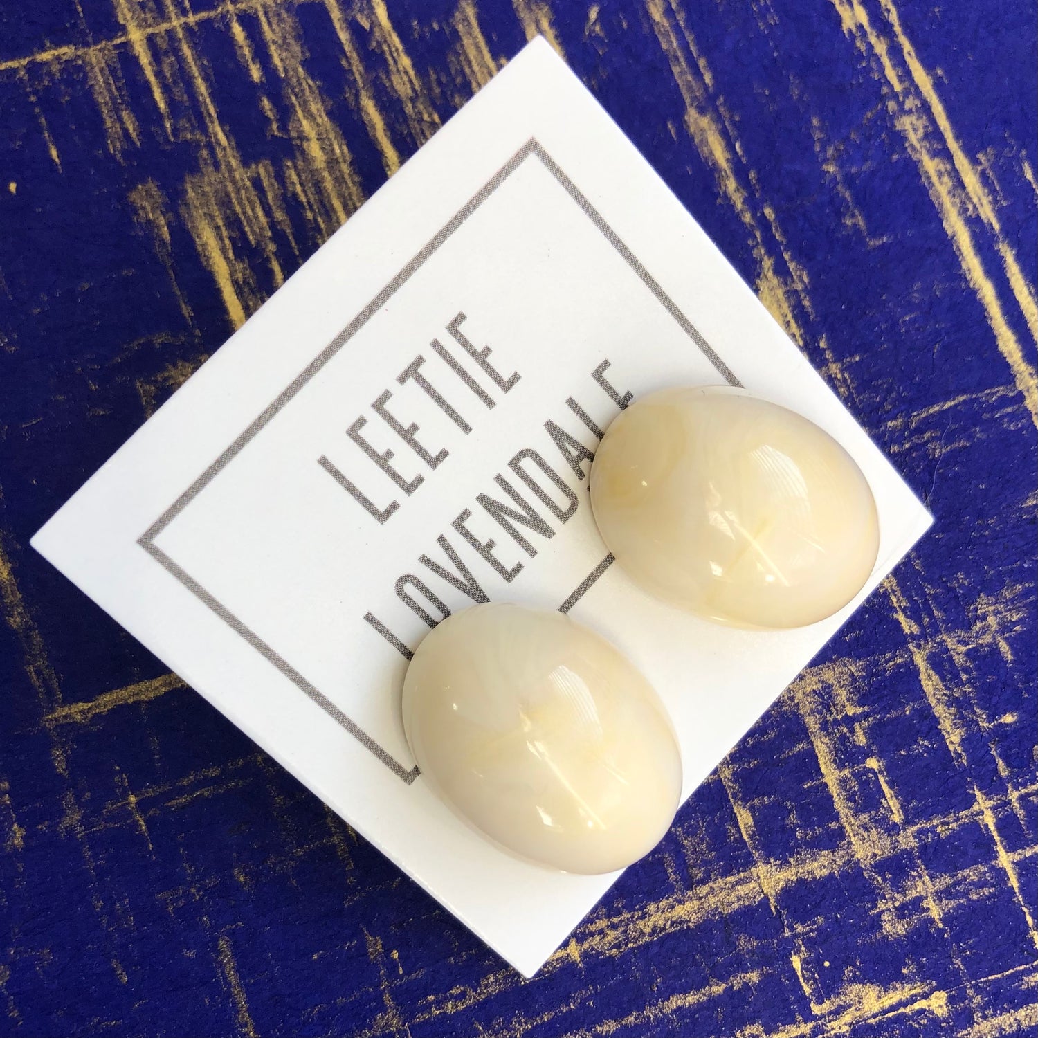 Cream Marbled Oval Lucite Stud Earrings