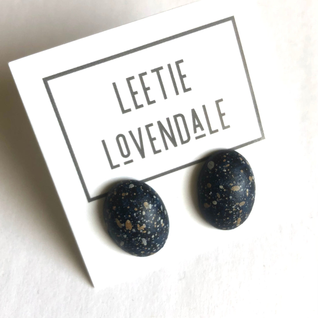 Black Paint Spattered Oval Lucite Stud Earrings