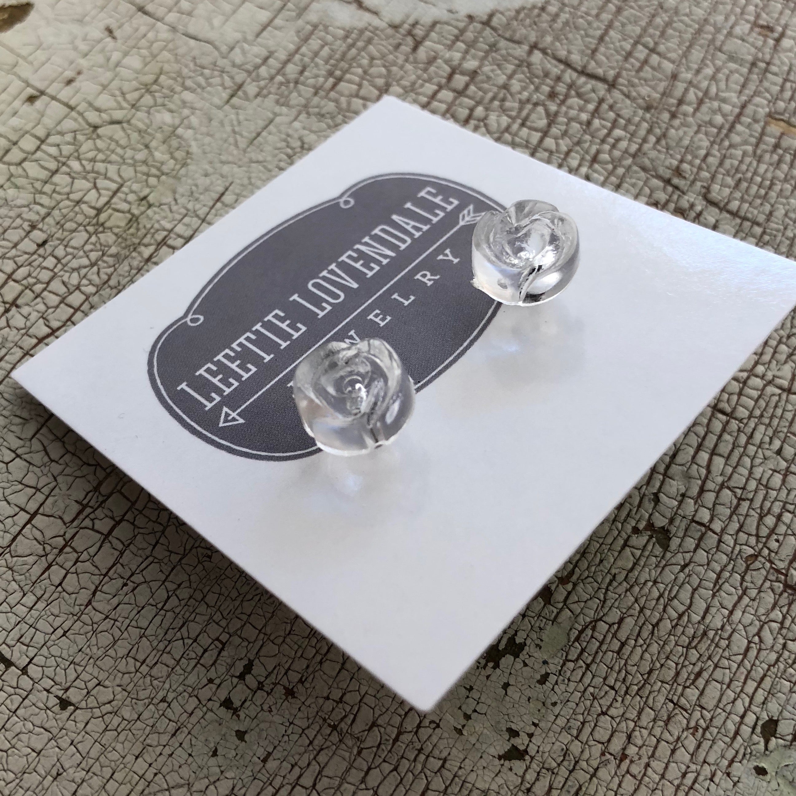 carved clear studs