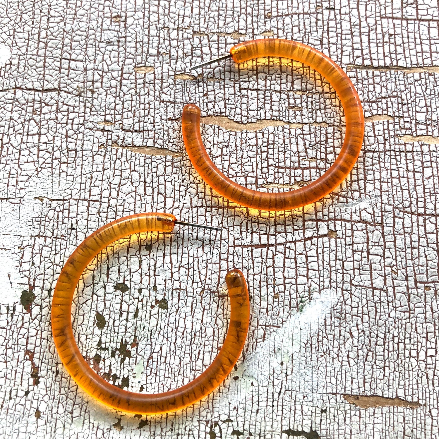 orange tube hoop earrings