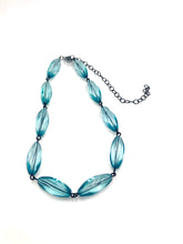 teal blue transparent necklace